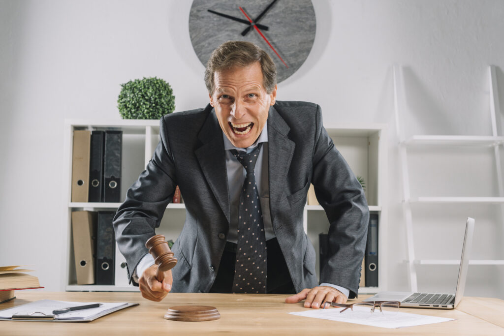 Illustration of a person managing their anger in a healthy way, showing calm and assertive expression amidst a stressful situation.